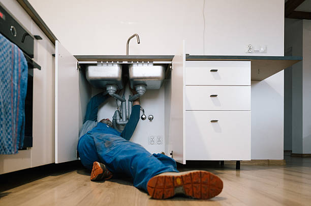 Professional Plumbing technician working in Freehold, NJ
